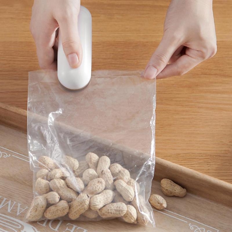 Portable Mini Sealing Machine Household Food Sealer for Plastic Bag Kitchen Tool Home Kitchen Packaging Essential Supplies - ebowsos